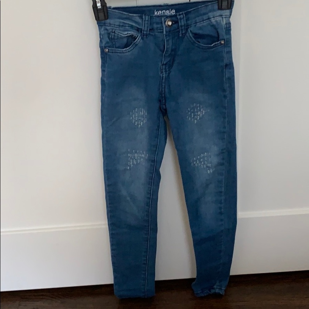 Kids lightly distressed blue jeans